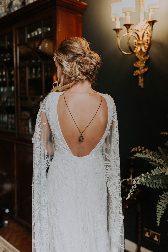 loose-updo-with-low-back-wedding-dress