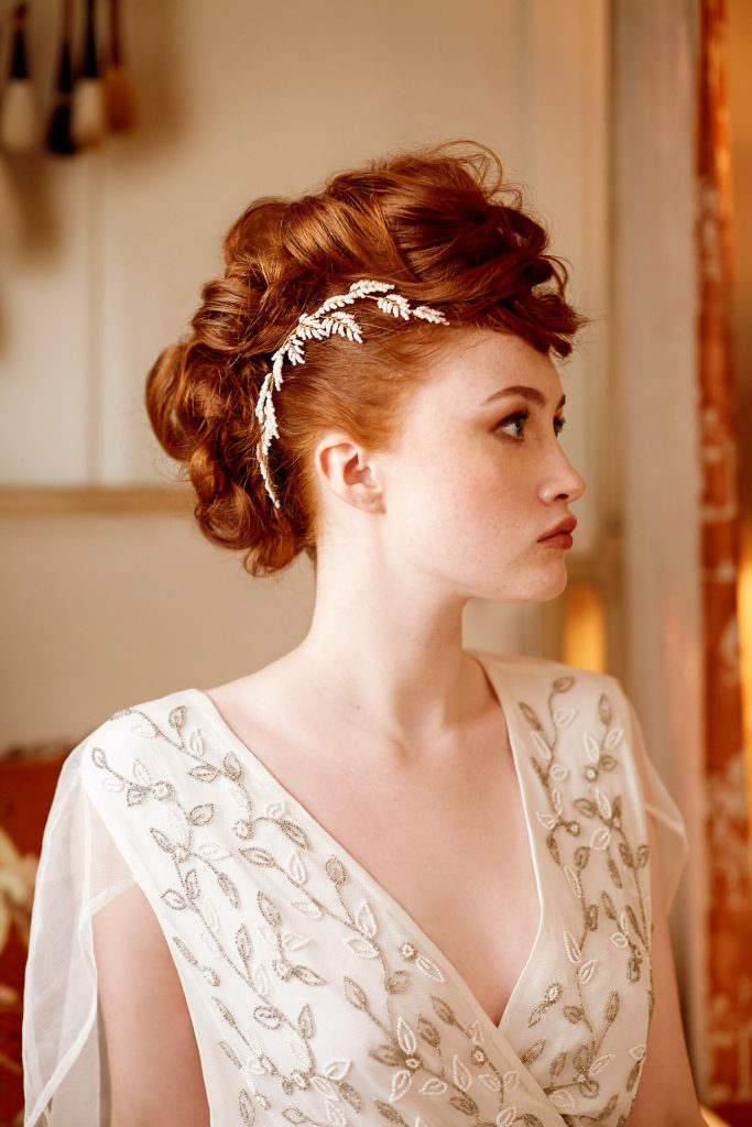 fauxhawk-bridal-updo-with-crystal-hair-accessories