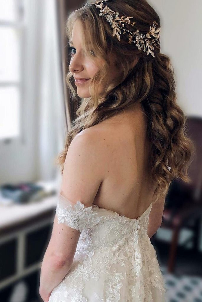 half up half down bridal hair with hair vine