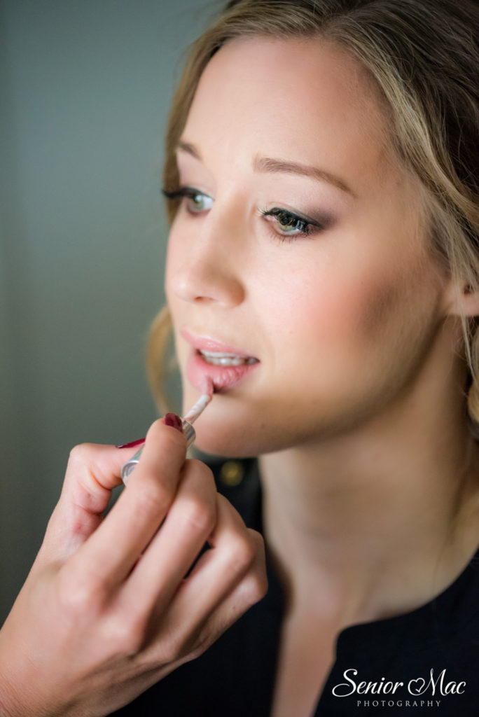 Pink lips add a touch of fairytale magic to a bride's look